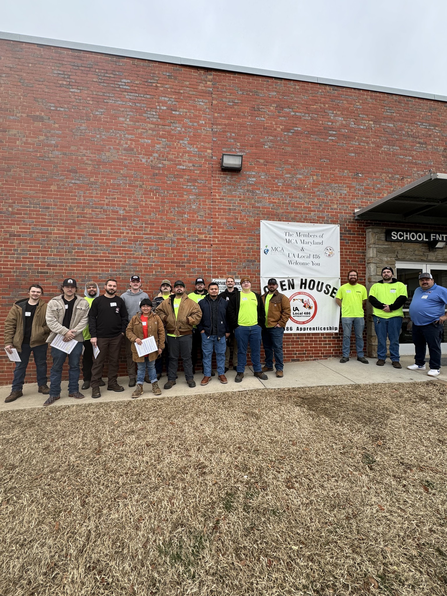 apprentices and instructors outside of the 486 school before open house starts