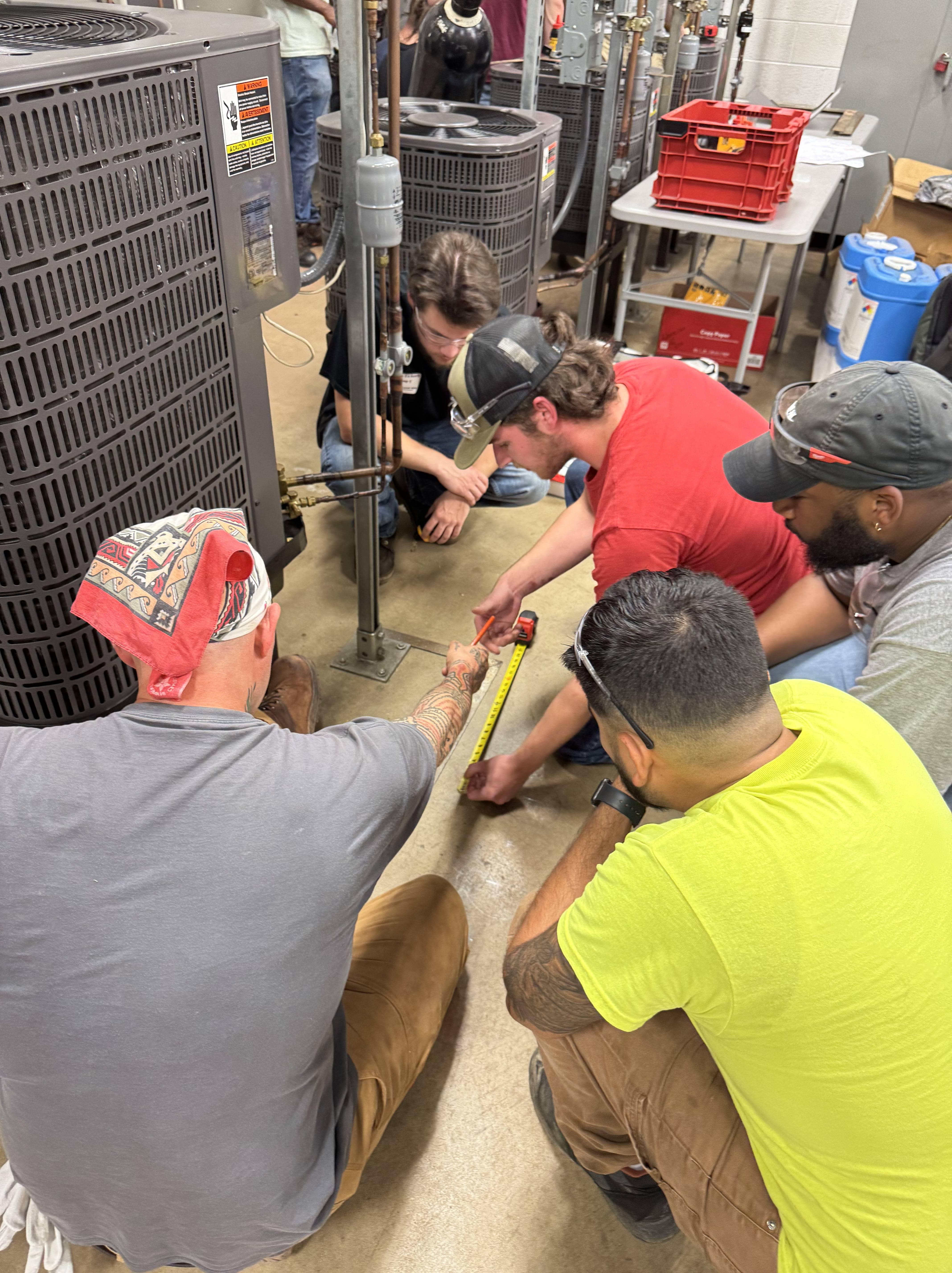 apprentices learning HVAC 