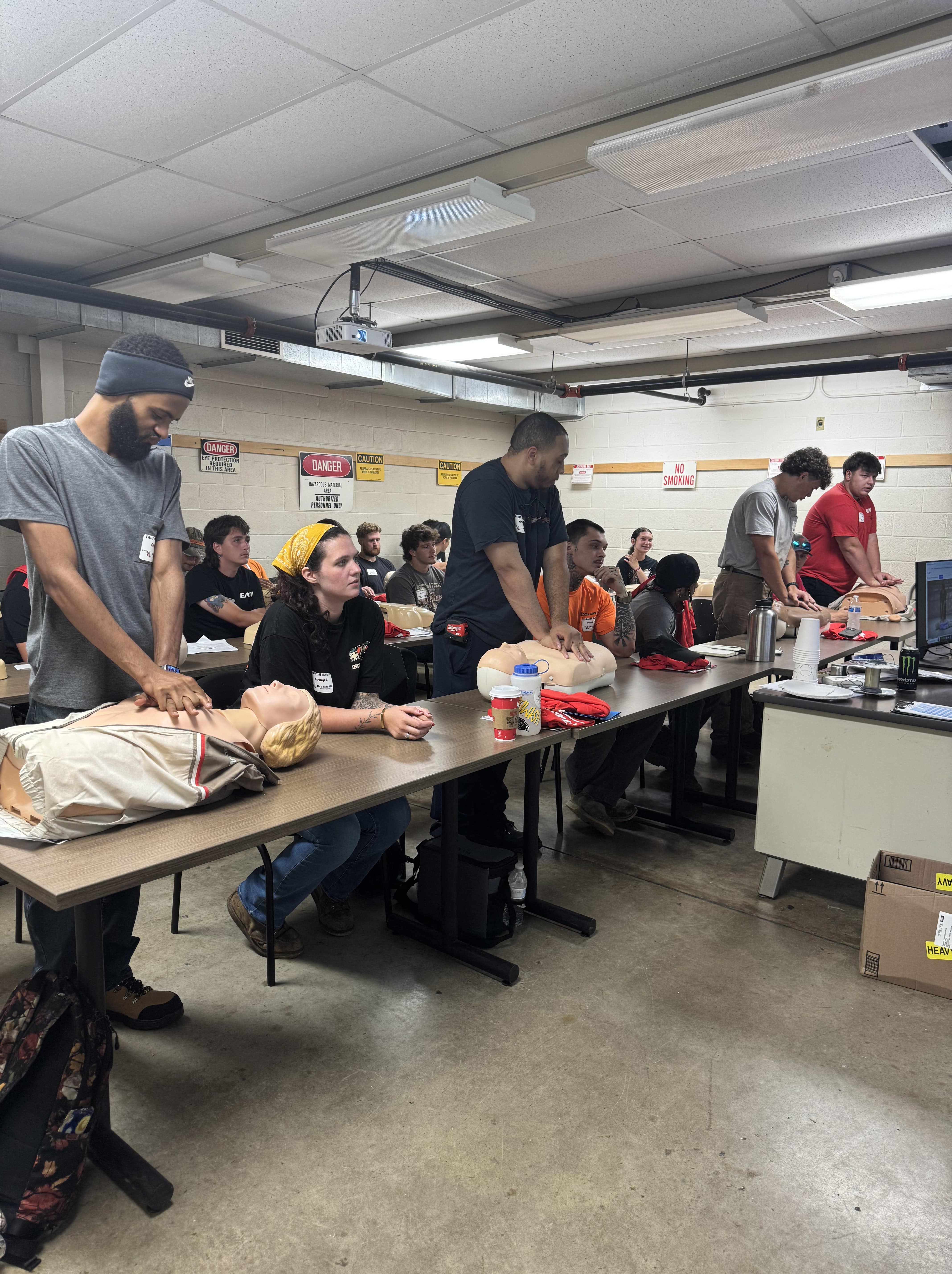 apprentices learning cpr